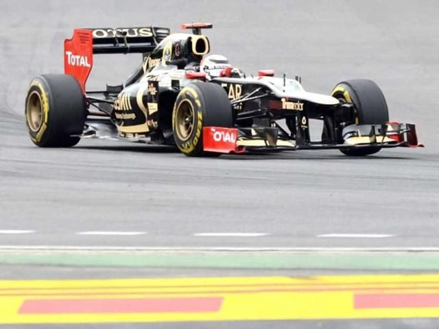 Lotus driver Kimi Raikkonen of Finland takes a corner during the qualifying round of the Formula One Korean Grand Prix in Yeongam. AFP / Roslan Rahman