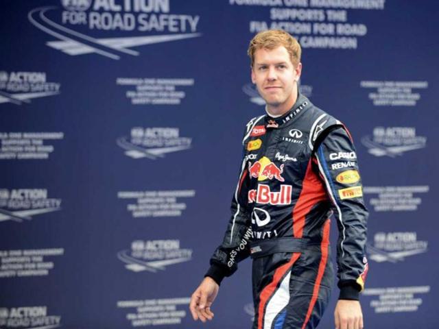 Second-placed Red Bull-Renault driver Sebastian Vettel of Germany reacts after the qualifying session of the Formula One Korean Grand Prix in Yeongam. AFP / Roslan Rahman