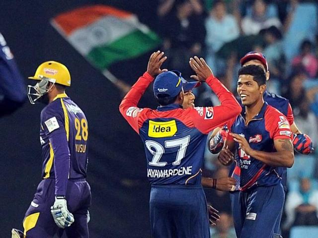 Delhi Daredevils Umesh Yadav celebrates the dismissal of Kolkata Knight Riders Yusuf Pathan during Group A of The Champions League T20 (CLT20) at Super Sports Park in Centurion. AFP Photo
