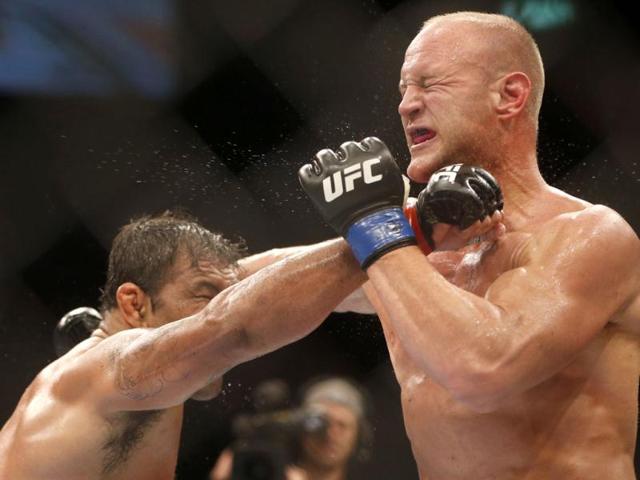 Minotauro Nogueira, left, from Brazil, fights Dave Herman, from the United States, during their heavyweight mixed martial arts bout at the Ultimate Fighting Championship 153 in Rio de Janeiro, Brazil. Nogueira defeated Herman. AP/Felipe Dana