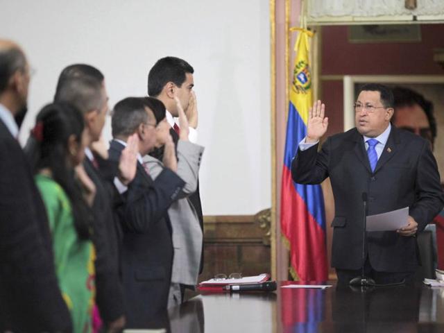 Venezuelan President Hugo Chavez takes an oath with new cabinet ministers at Miraflores Palace in Caracas. Reuters/Handout/Miraflores Palace