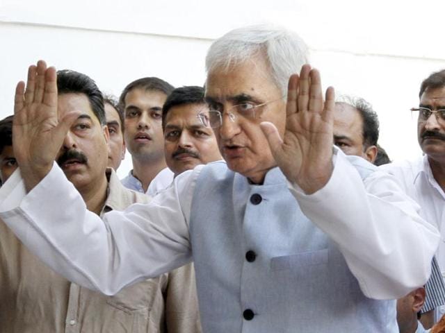 Union minister for law and justice Salman Khurshid at a press conference in New Delhi. Khurshid produced pictures and documents to defend himself against the allegations of financial irregularities levelled against his NGO. HT Photo/Arvind Yadav