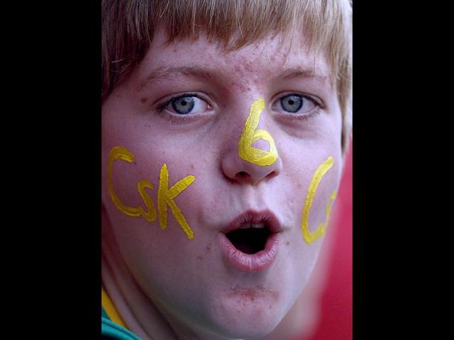Chennai Super Kings cricket fan looks on during the Champions League Twenty20 cricket match against Sydney Sixers at the Wanderers Stadium, Johannesburg. AP photo