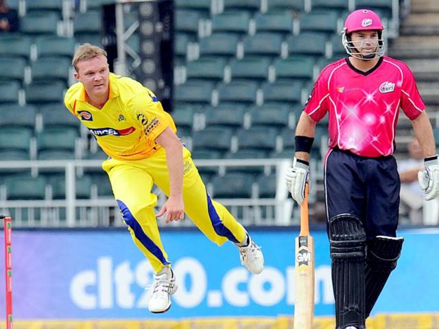 Chennal Super Kings bowler Doug Bollinger jumps next to Sydney Sixers batsman Moises Henriques during a Group B match of the Champions League T20 between the CSK and the Sydney Sixers at the Wanderers Stadium in Johannesburg. AFP photo