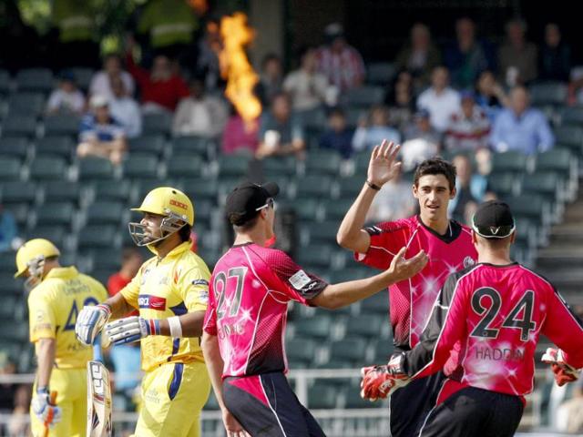 Chennai Super Kings batsman Murali Vijay leaves the field after being bowled by Sydney Sixers bowler Mitchell Starc for 1 run during the Champions League Twenty20 cricket match at the Wanderers Stadium, Johannesburg. AP photo