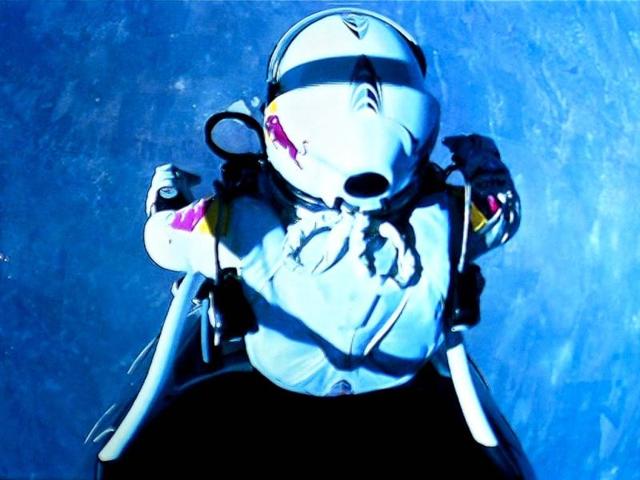 This image taken from a video monitor, provided by Red Bull Stratos, shows Felix Baumgartner before he jumps out of the capsule during the final manned flight for Red Bull Stratos. AP/Red Bull Stratos, Jay Nemeth