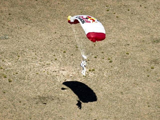 Felix Baumgartner lands in the desert after completing the final manned flight for Red Bull Stratos in Roswell, New Mexico. Reuters/Red Bull Handout