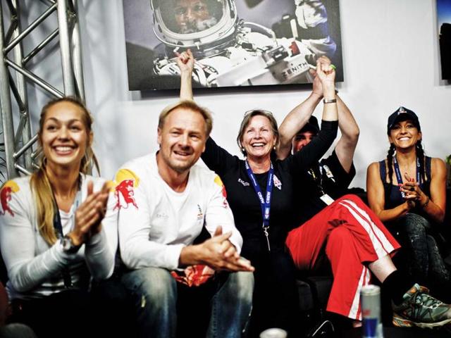 This picture provided by www.redbullcontentpool.com shows family members and friends celebrating the successful jump of Felix Baumgartner aboard Red Bull Stratos in Roswell, New Mexico. AFP/Red Bull Handout