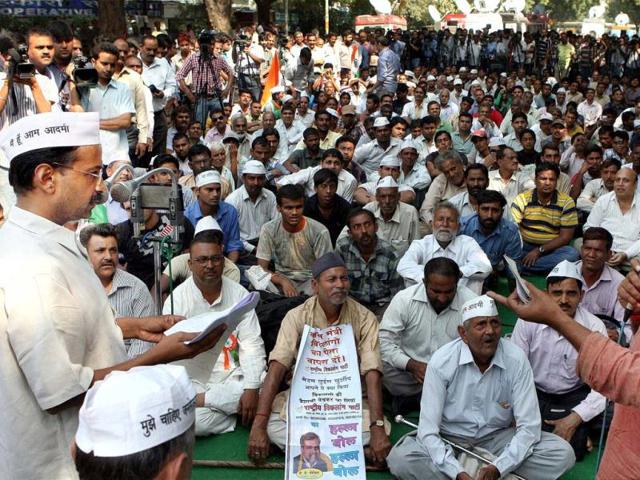 India Against Corruption politician Arvind Kejriwal addresses supporters during a protest at Jantar Mantar in New Delhi . PTI Photo