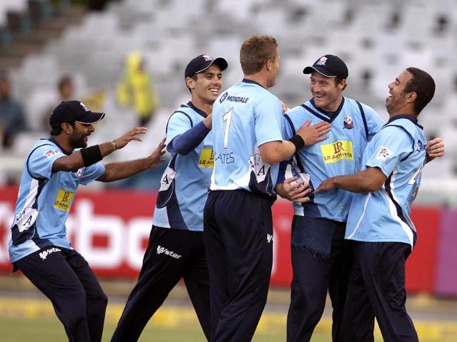 Auckland Aces team members react with Michael Bates, center, as they take the wicket of Kolkata Knight Gautam Gambhir, unseen, during the Champions League Twenty20 cricket game in Cape Town, South Africa. AP Photo/Schalk van Zuydam