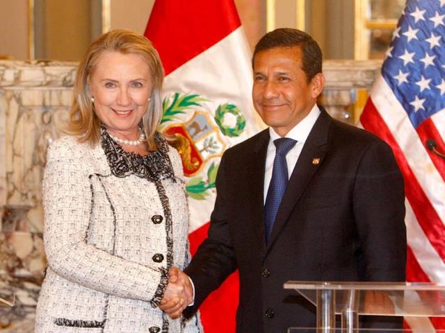 Peru's President Ollanta Humala shakes hands with US secretary of state Hillary Rodham Clinton in Lima, Peru. AP/Karel Navarro