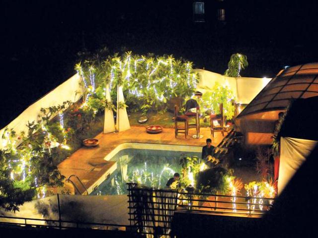 This is the poolside area of the terrace of Saif's duplex.