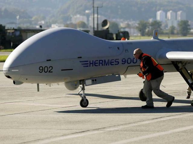 Ground crew monitors the Israeli Elbit Systems Ltd. Hermes 900 unmanned aerial vehicle (UAV) during a presentation at the airbase in the central Swiss town of Emmen. Reuters/Pascal Lauener