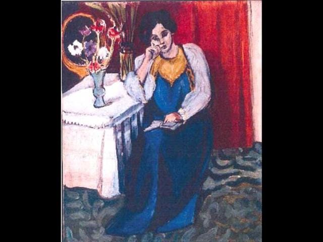 Dutch police handout shows the painting "La Liseuse en Blanc et Jaune" by Henri Matisse stolen during a break-in at Rotterdam's Kunsthal museum. AFP PHOTO