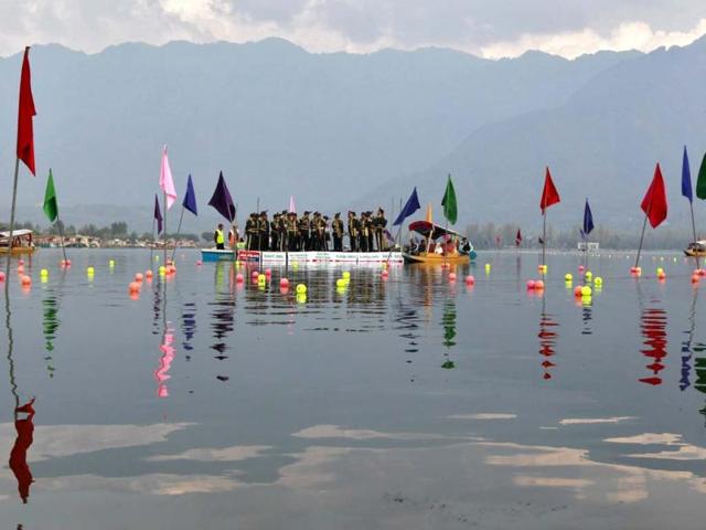 Jammu and Kashmir police band stand on a boat on the waters of Dal Lake during the opening ceremony of "Jashan-e-Dal" in Srinagar. Jammu and Kashmir Police opened "Jashan-e-Dal", a three-day long water sports event to encourage the younger generation of troubled Kashmir towards water sports. Reuters photo