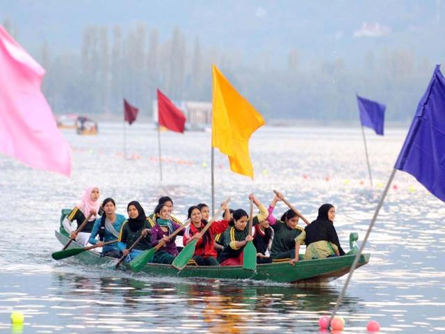 Youngsters participate in water sports games event during the opening ceremony of "Jashan-e-Dal" at Dal Lake in Srinagar. AFP photo