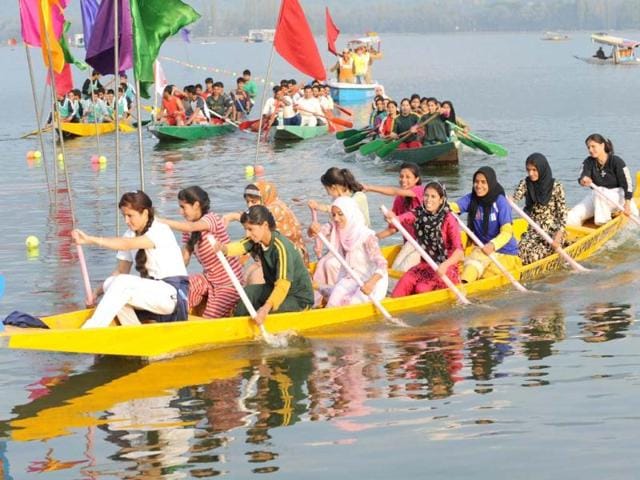 Youngsters participate in water sports games event during the opening ceremony of "Jashan-e-Dal" at Dal Lake in Srinagar. AFP photo