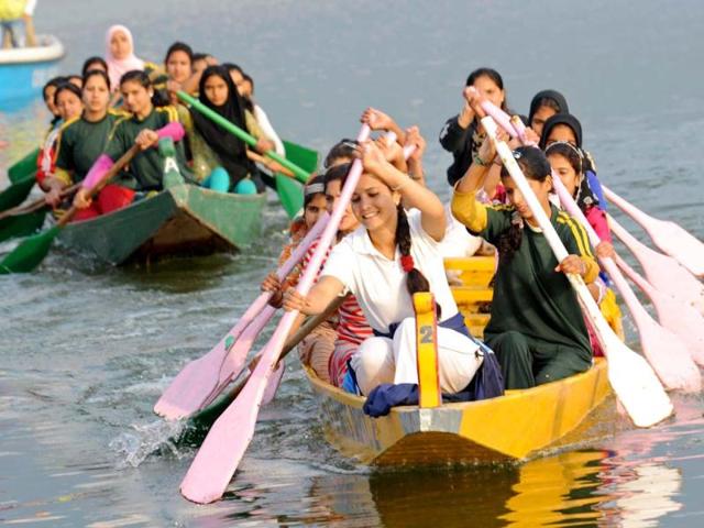 Youngsters participate in water sports games event during the opening ceremony of "Jashan-e-Dal" at Dal Lake in Srinagar. AFP photo