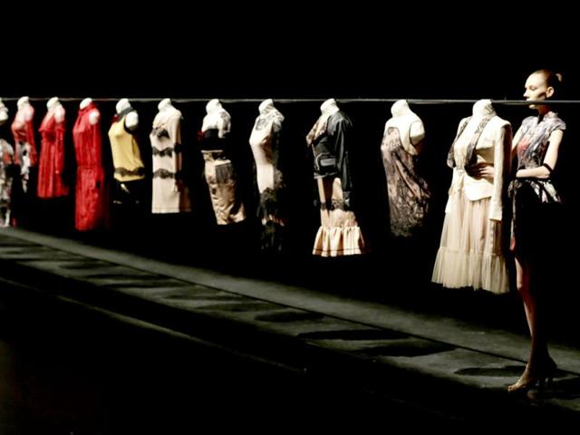 A model displays creations by Japanese designer Motonari One during the 2013 spring/summer collection at Tokyo Fashion Week in Tokyo. AP photo