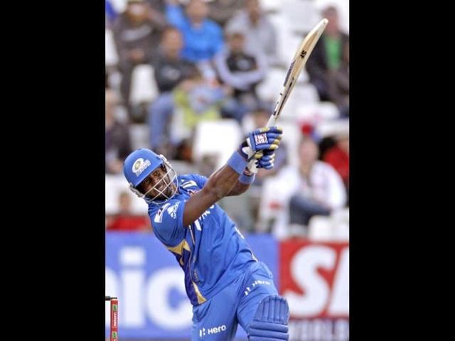 Mumbai Indians Dwayne Smith, right, plays a shot against Yorkshire during the Champions League Twenty20 in Cape Town. AP Photo/Schalk van Zuydam