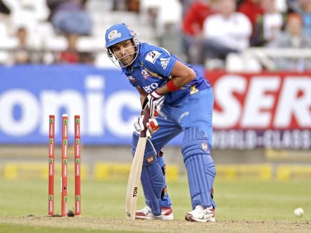 Mumbai Indians Rohit Sharma, looks up after the ball hit his wicket against Yorkshire during the Champions League Twenty20 in Cape Town. AP Photo/Schalk van Zuydam