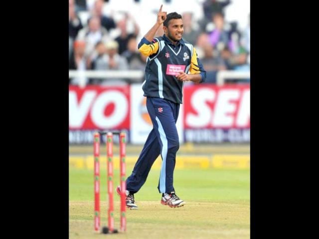 Adil Rashid of Yorkshire Carnegie celebrates after taking the wicket of Rohit Sharma of the Mumbai Indians during Match 11 of The Champions League T20 (CLT20) between the Mumbai Indians (India) and Yorkshire (England) at Newlands Cricket Stadium in Cape Town. AFP Photo/Luigi Bennett