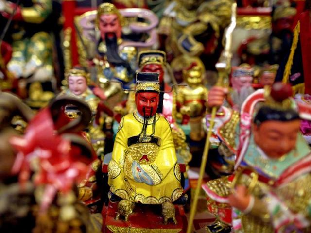 Statues are placed at Ban Tha Rua Chinese shrine before a procession celebrating the annual vegetarian festival in Phuket. (Reuters/Damir Sagolj)