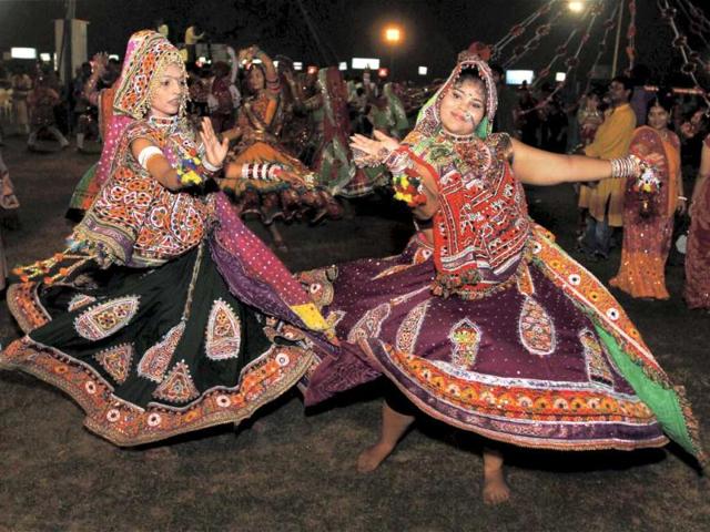 Youngsters take part in a Garba programme during Navratri festival in Ahmedabad. PTI Photo