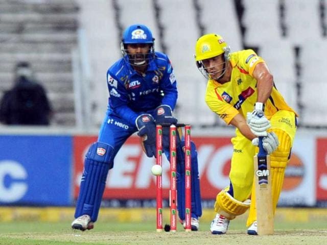 Chennai Super Kings batsman Francois Du Plessis (R) plays a shot during the Champions League T20 (CLT20) game between Chennai Super Kings and Mumbai Indians at the Wanderers Stadium in Johannesburg. AFP Photo/Alexander Joe