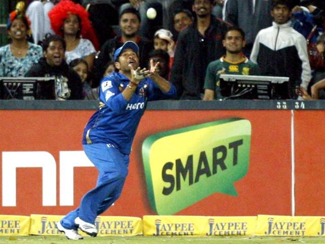 Mumbai Indians fielder Sachin Tendulkar takes a catch to dismiss Chennai Supper Kings's batsman Albie Morkel, unseen, during their Champions League Twenty20 cricket match at the Wanderers Stadium in Johannesburg. AP Photo/Themba Hadebe