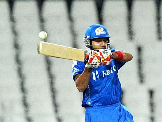 Mumbai Indians batsman Rohit Sharma plays a shot during a Group B Champions League T20 (CLT20) match against Chennal Super Kings at Wanderers Stadium in Johannesburg. AFP Photo/Alexander Joe