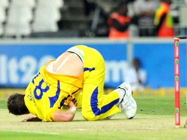 Chennal Super Kings bowler Albie Morkel falls during a Group B Champions League T20 (CLT20) match against Mumbai Indians at Wanderers Stadium in Johannesburg. AFP Photo/Alexander Joe