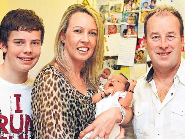 Happy-family-Rebecca-and-Michael-Baker-with-son-Josh-L-and-the-latest-addition-to-their-family-Kai-Lannox-Sunil-Saxena-HT-Photo Happy-family-Rebecca-and-Michael-Baker-with-son-Josh-L-and-the-latest-addition-to-their-family-Kai-Lannox-Sunil-Saxena-HT-Photo