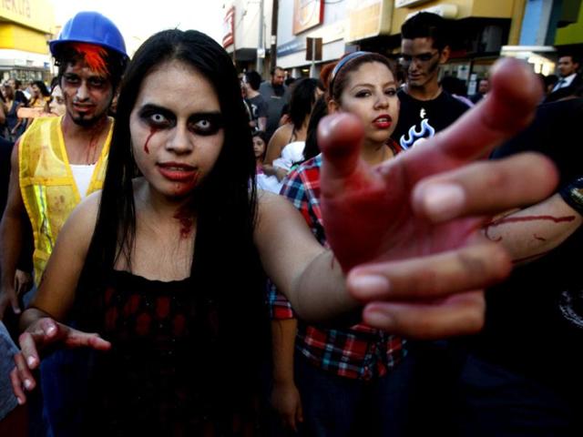 People dressed up as zombies participate in a "zombie walk" in Ciudad Juarez. Children and adults dressing up as zombies took part in the "Zombie Walk Ciudad Juarez", aimed at collecting food and hygiene kits to support the community centre "Sowers of Peace and Hope", which helps children in this border city, local media reported. Reuters