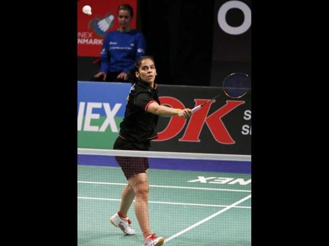 Saina Nehwal competes during the Denmark Open woman's single final badminton match against Juliane Schenk of Germany in Odense, Denmark. 2012. AP Photo