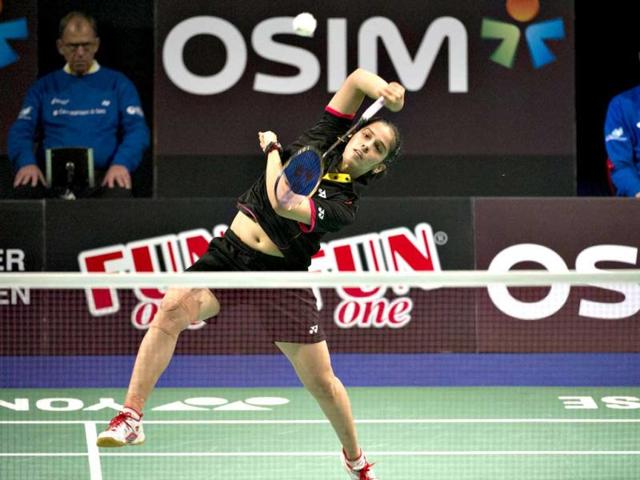 Saina Nehwal returns to Juliane Schenk of Germany during their women's singles final match at the Danish Open badminton championship in Odense, Denmark. AFP Photo