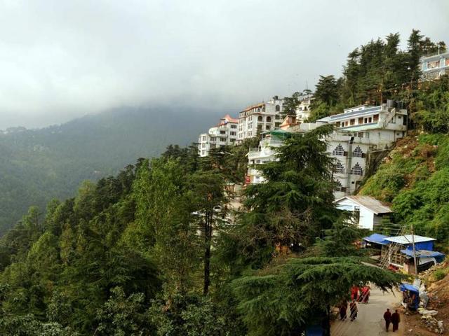 This-picture-taken-on-September-25-2012-shows-a-general-view-of-hillside-hotels-restaurants-and-shops-on-a-slope-in-McLeod-Ganj-Dharamshala-Photo-Manjunath-Kiran This-picture-taken-on-September-25-2012-shows-a-general-view-of-hillside-hotels-restaurants-and-shops-on-a-slope-in-McLeod-Ganj-Dharamshala-Photo-Manjunath-Kiran