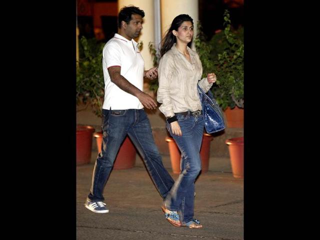 Friends and family arrive at Lilavati hospital to pay their regards.