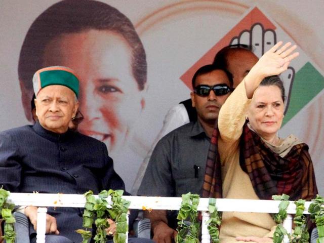 Congress president Sonia Gandhi and Virbhadra Singh during an election rally, in Mandi, Himachal Pardesh. Assembly elections in Himachal Pradesh are scheduled to be held on November 04. (Sanjeev Sharma /Hindustan Times)