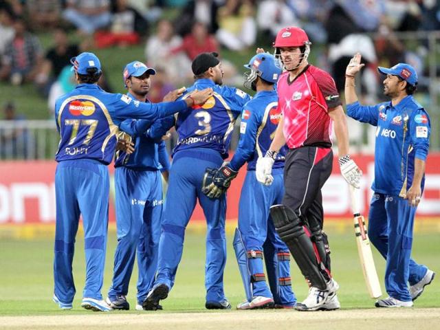 Moise Henriques of the Sydney Sixers walks off as the Mumbai Indians celebrate his wicket during a Champions League T20 (CLT20) match Sydney Sixers vs Mumbai Indians at Sahara Stadium Kingsmead in Durban. AFP Photo