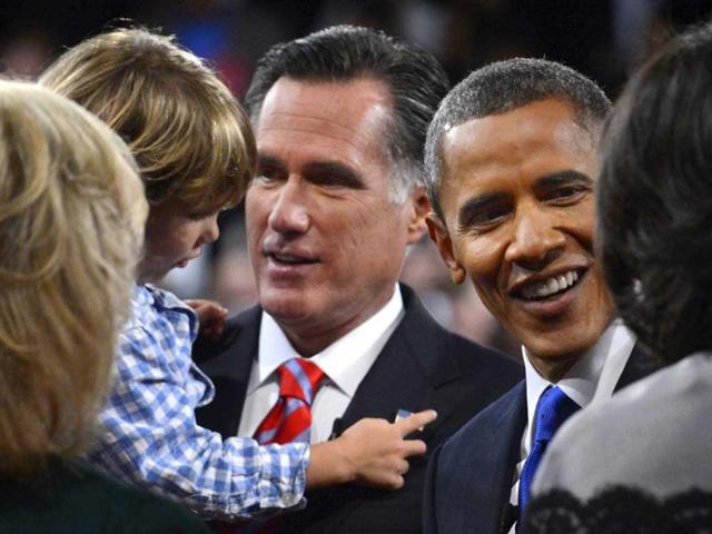 President Barack Obama and Republican presidential nominee Mitt Romney meet family members after the third presidential debate at Lynn University, in Boca Raton, Fla. (AP Photo/Pool-Michael Reynolds)