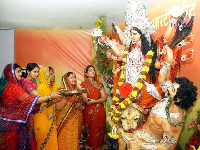 Devotees performing Durga Pooja on the ninth day of Durga Puja in Bangalore. (Agencies)