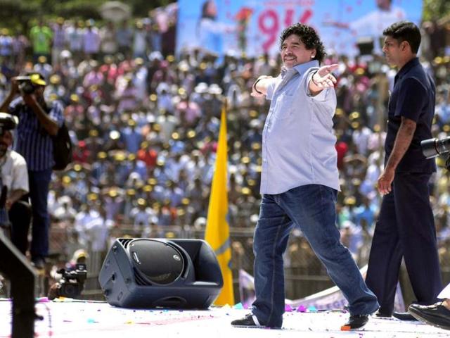 Argentine soccer legend Diego Maradona entertains fans in Kannur, Kerala. Maradona arrived on a two-day private visit. (AP Photo)