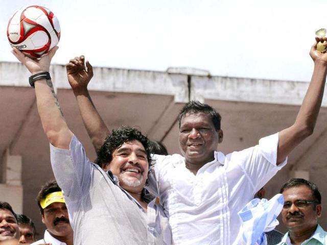 Football legend Diego Armando Maradona and IM Vijayan at Jawahar Stadium in Kannur. PTI Photo