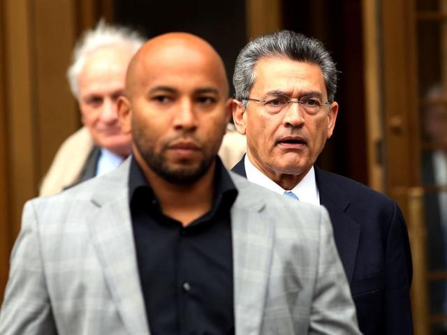 Rajat Gupta (R), former Goldman Sachs Inc. director and former senior partner at McKinsey & Co., exits federal court after being sentenced to two years in prison in New York City. AP photo Rajat Gupta (R), former Goldman Sachs Inc. director and former senior partner at McKinsey & Co., exits federal court after being sentenced to two years in prison in New York City. AP photo