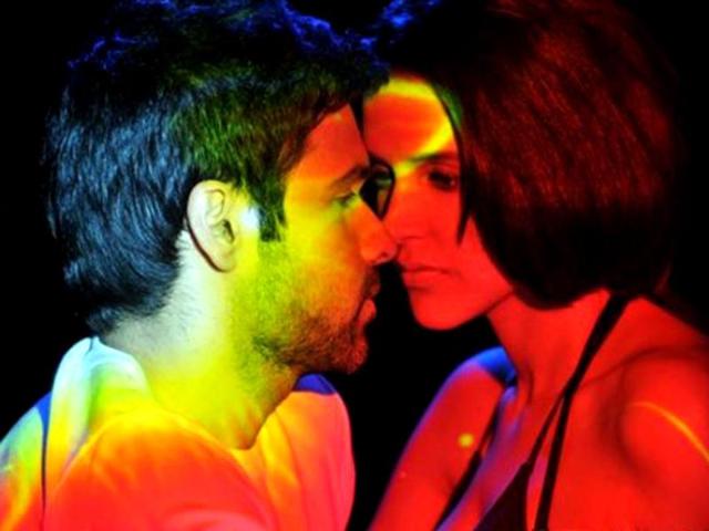 Neha Dhupia and Emraan Hashmi get steamy in a still from Rush.