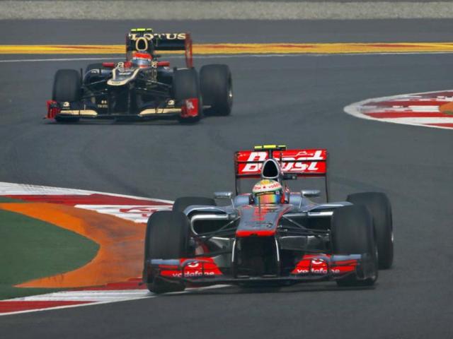 Lewis Hamilton leads Lotus driver Romain Grosjean during the first practice session for the Indian Formula One Grand Prix at the Buddh International Circuit in Noida. AP Photo