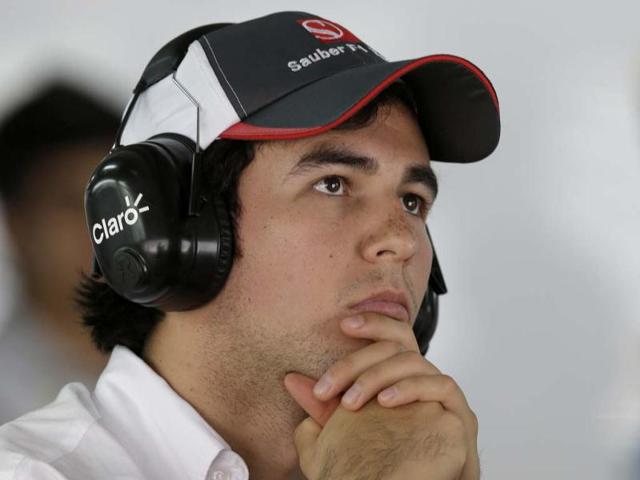 Sauber driver Sergio Perez of Mexico watches a screen during the first practice session for the Indian Formula One Grand Prix at the Buddh International Circuit in Noida. AP Photo