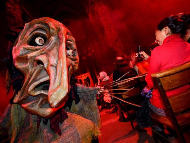 A creature walks during "The Grand Procession of the Ghouls" at the Halloween Extravaganza and Procession of the Ghouls at the Cathedral of St. John the Divine in New York. (AFP Photo)