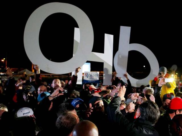 Republican presidential nominee Mitt Romney greets audience members at a campaign rally in North Canton, Ohio. (Reuters)